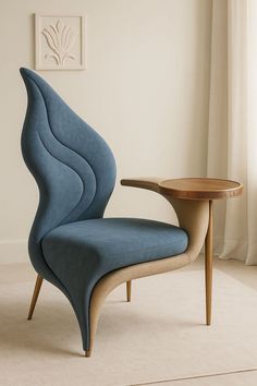 a blue chair sitting next to a wooden table