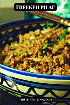 a bowl filled with meat and vegetables next to a box of rice