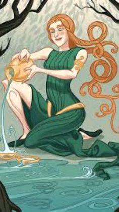 a woman is sitting in the water with her cat