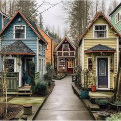 many colorful houses are lined up on the street