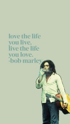bob marley with guitar and quote about love the life you live, give the life you love