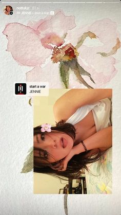 the girl is posing in front of a flower