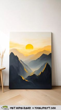 a painting is shown on the wall next to a chair