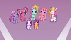 many little ponys are lined up in a row