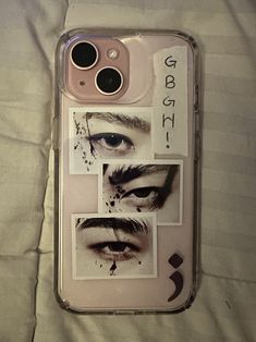 an iphone case with pictures of eyes on it
