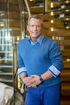 a man standing in front of some stairs
