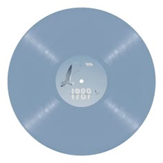 a blue record with an image of a bird on the disc, which reads 1960