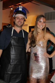 a man and woman dressed up in costumes