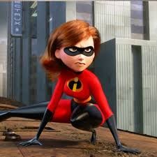 the incredible spider - man is posing in front of an office building with her hands on her hips