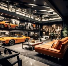 an orange sports car in a showroom next to two couches and a coffee table
