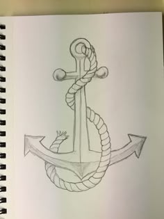 a drawing of an anchor with a rope on the front and back end, is shown