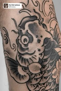 a man's leg with tattoos on it and an image of a fish in the water