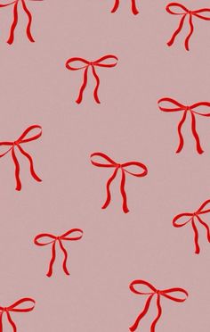 red bows tied together on pink paper with black outline in the center and bottom corner