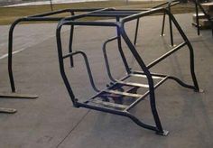 there is a metal chair sitting on the ground