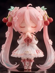 Sakura Miku figure praying