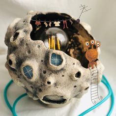 there is a rock with some decorations on it