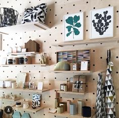 the shelves are filled with various items on them