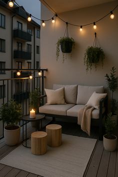 a couch and table on a balcony with potted plants
