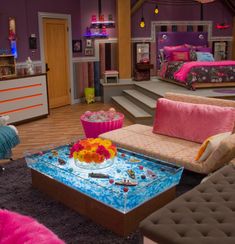 a living room filled with lots of furniture and decor