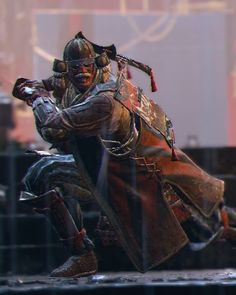 an image of a man in armor kneeling down