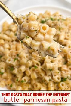 a spoon full of macaroni and cheese with the words, that pasta that broke the internet butter parmesan pasta