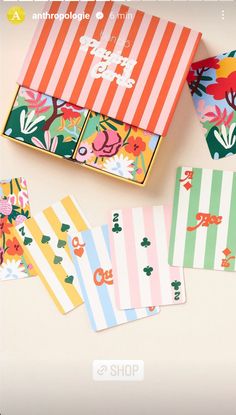 an assortment of stationery cards in a box