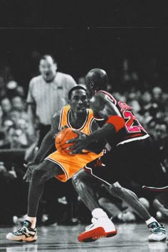 two basketball players in action on the court