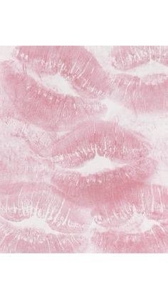 a pink and white background with lots of small clouds