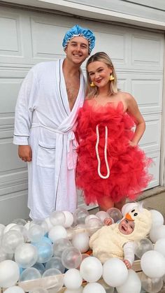a man and woman dressed up in costumes