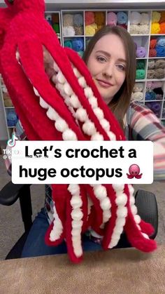 a woman sitting in front of a large stuffed octopus with the caption that reads, let's crochet a huge octopus