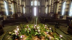 an image of a church with flowers in the floor and light coming through the windows
