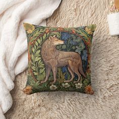 a decorative pillow with a wolf on it