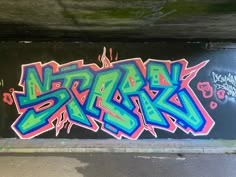 some graffiti on the side of a building