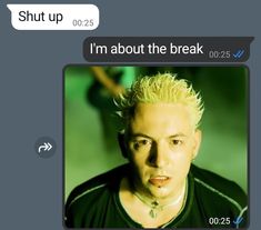 a man with blonde hair is looking at the camera and has an awkward look on his face