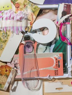 a collage of various items including scissors, tape and paper
