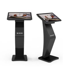 two electronic displays are shown on the same stand as each other, both displaying different images