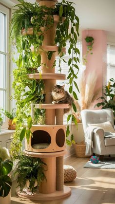 a cat tree in the middle of a living room with lots of plants on it