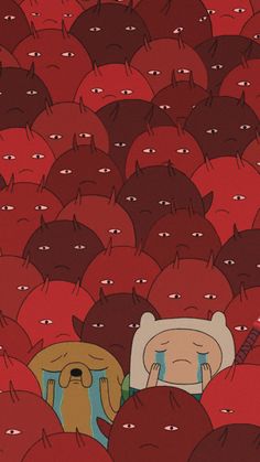 a bunch of people that are standing in the middle of a crowd with one person covering their eyes