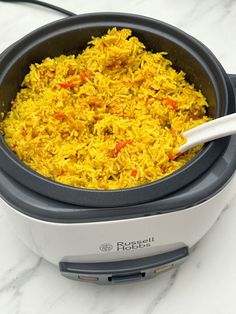 a close up of a rice dish in a slow cooker