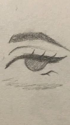 a pencil drawing of an eye with long eyelashes
