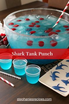 a blue drink with red and white straws in it, surrounded by other drinks