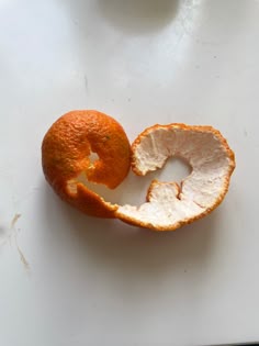 an orange that has been peeled in half