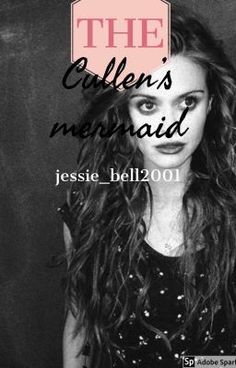 a woman with long hair standing in front of a blackboard