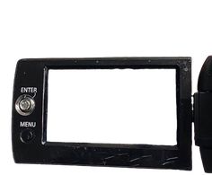 a black digital camera with a white screen and the lens facing up on a white background
