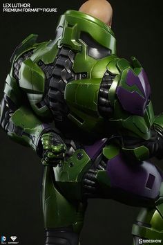 a green and purple robot is posed in front of a black background