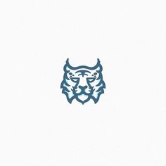 a tiger's head is shown in blue on a white background