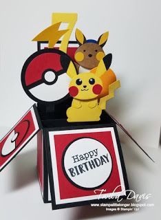 an origami pokemon birthday card with pokeball and pikachu