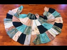 an old skirt is laying on the floor