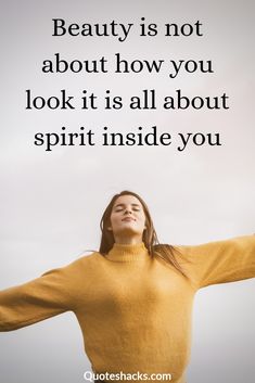 a woman with her arms outstretched in front of the sky and text that reads beauty is not about how you look it is all about spirit inside you