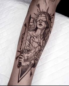 a person with a tattoo on their arm